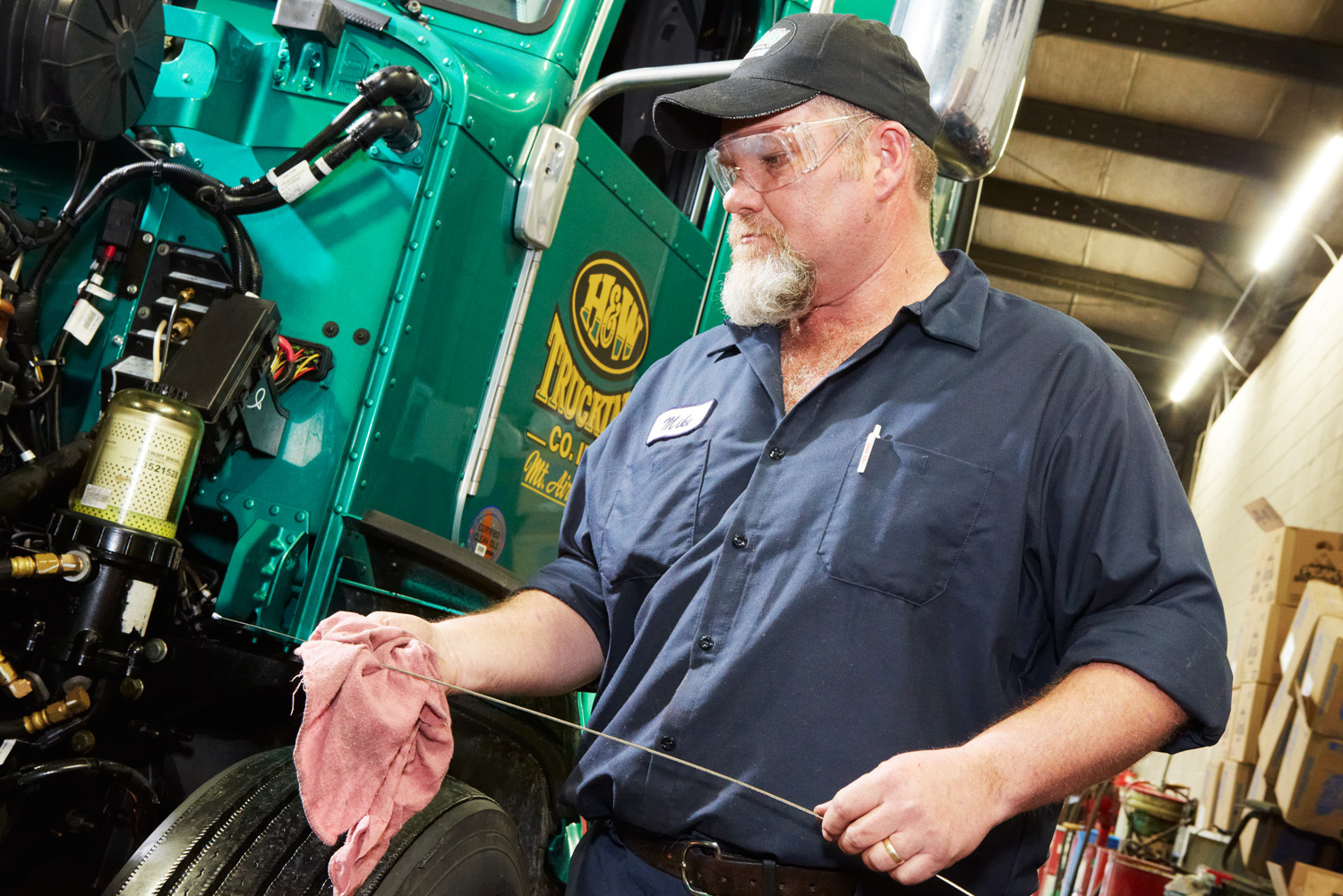 A technician checks the oil in a truck in North Carolina.