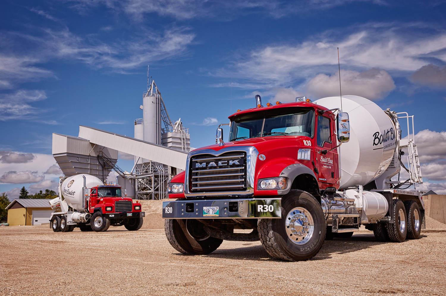 Two generations of Mack trucks in southern Alberta