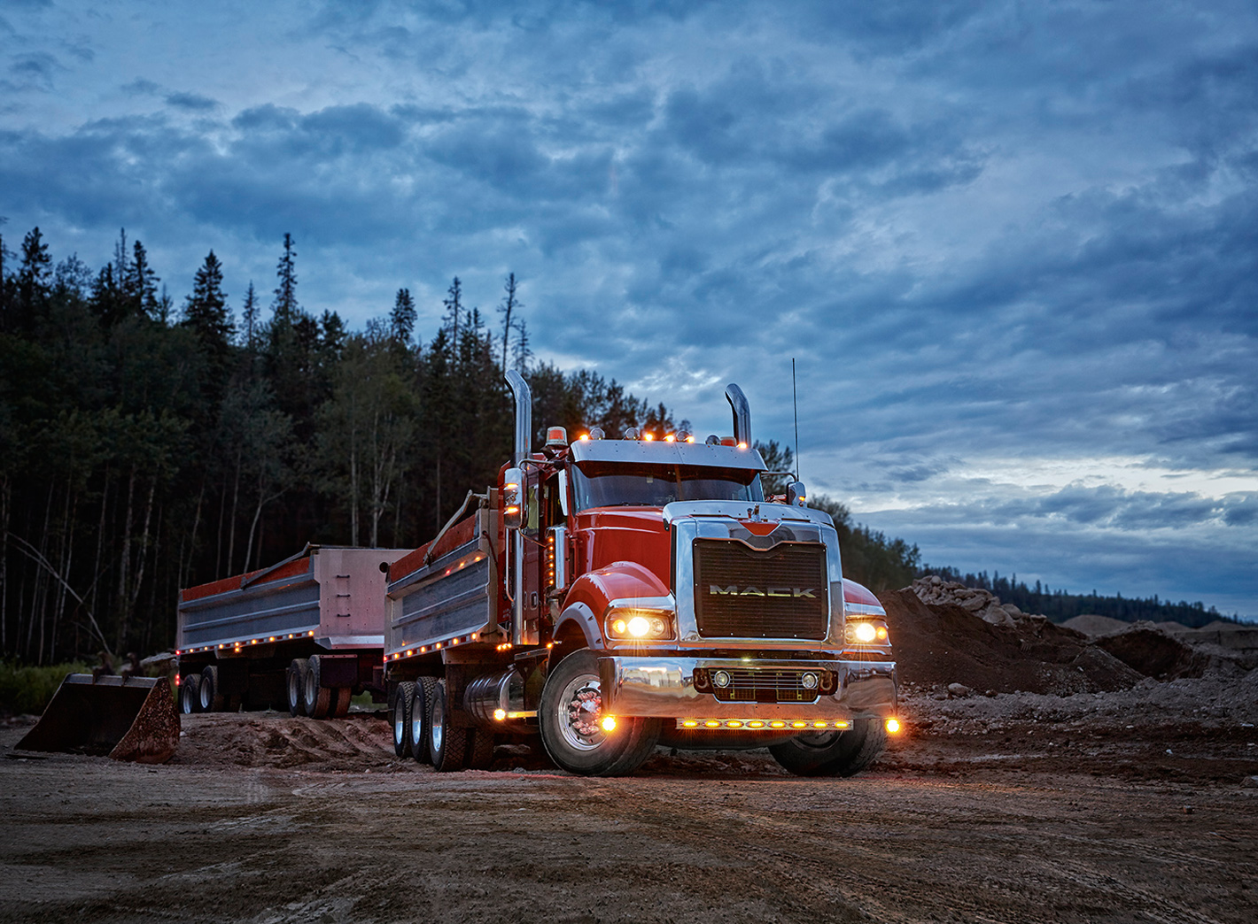 A massive Mack Titan and pup trailer ready to load in northern Alberta