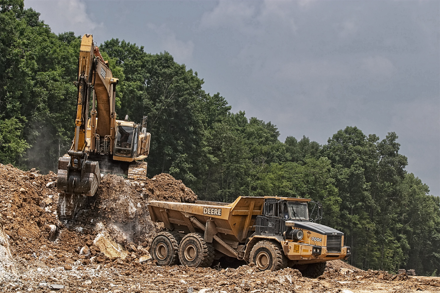 Heavy duty John Deer equipment working on a highway project in Arkansas