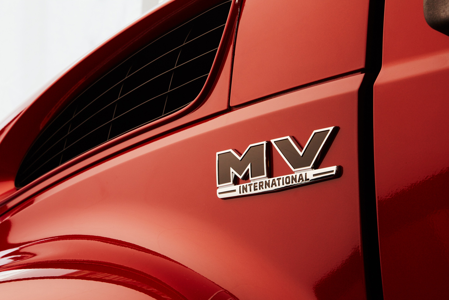 The hood and badge of a Navistar International MV model