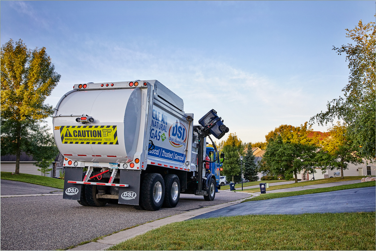 A McNeilus refuse body swallows debris from a neighborhood in southern Minnesota.