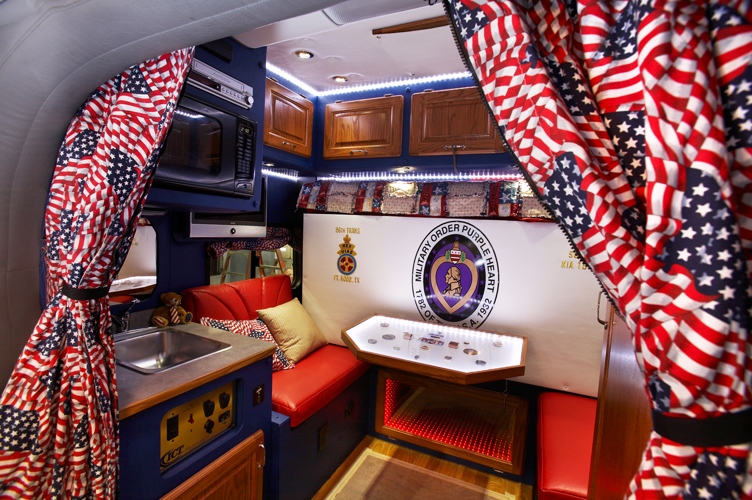 The interior of a customized, patriotic sleeper compartment