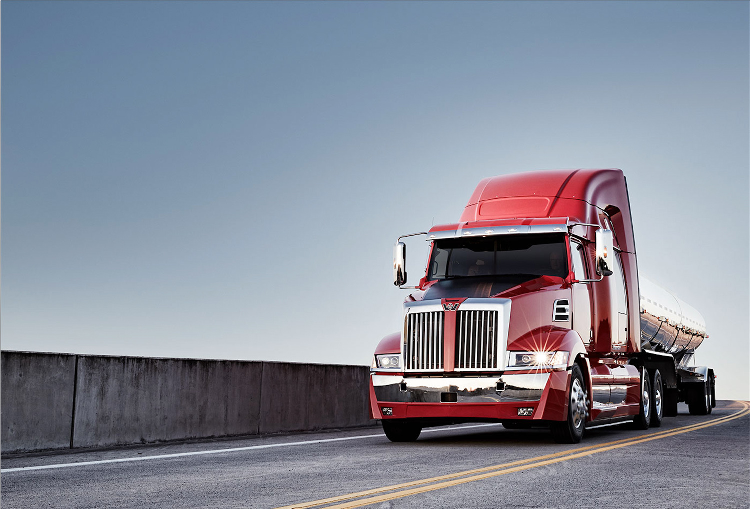 A Western Star 5700 and petroleum tanker on a highway overpass in Oregon